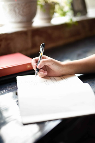woman writing diary